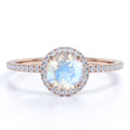 1.75 Carat Round Cut Blue Moonstone and Moissanite Halo Engagement Ring in 18k Rose Gold over Silver E1011